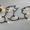 Миниатюра фото гирлянда нить с колпачком 10м тепло-белая 24в, 100 led, провод черный пвх, ip65 ltc pst100cap-11-1ww | 220svet.ru